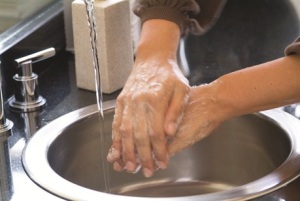 Photo of person washing their hands