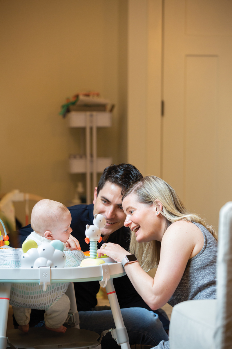 Marta Perez, MD, Michael Chomat, MD, and their son, Paul, at home